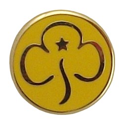 A Brownie Badge, loaned by the 2nd Hinchley Wood Brownie Unit.