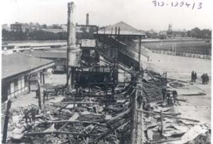 An image of the burnt grandstand at Hurst Park after Kitty Marion and Clara Giveen set fire to it in June 1913.