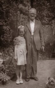 The donor with her grandfather Harry Payne in the back garden of H.G Payne's. Contributed by Sandra K.