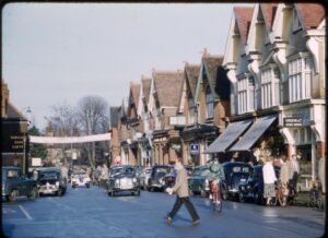 Cobham High Street, December 1956. Farrants is visible on the far right. Courtesy of I Lawton, contributed by Cobham Conservation & Heritage Trust.