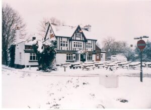 The Hare and Hounds pub, Claygate, in the snow, February 1991